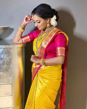 Mustard kanchipuram saree in maroon pink gold border