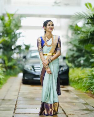 Sky blue wedding silk saree in violet 12 inches border