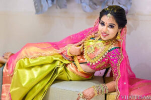 Parrot green wedding silk saree in contrast pink border