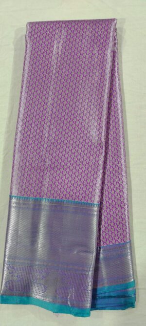 E0E1007 Lavender pattu saree in rama green border