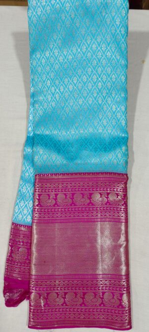 LL1005 Ananda blue wedding silk saree online at Hyderabad Bangalore in contrast  12 inches magenta border
