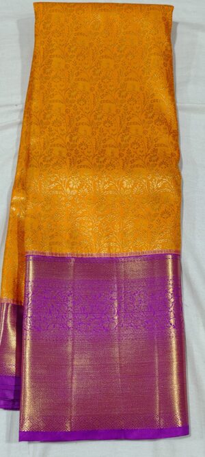 EE1024 Yellow kanchipuram silk saree online at Hyderabad Bangalore contrast purple border