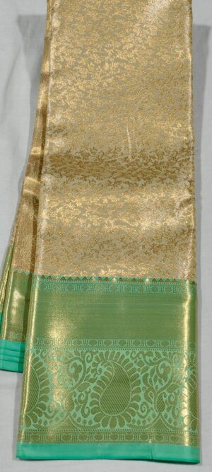 EE1025 Cream gold kanchi pattu sarees online at Hyderabad Bangalore contrast green border