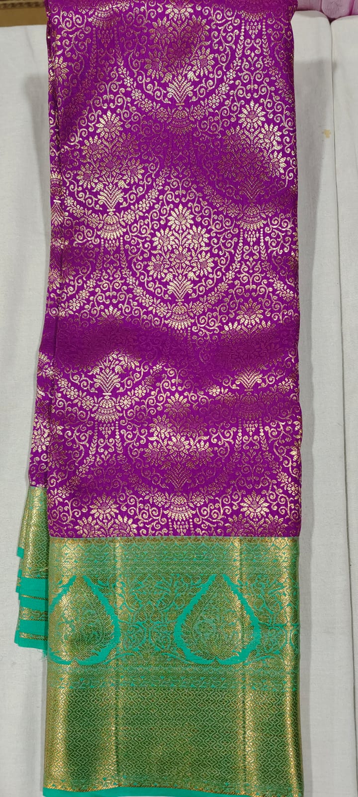 EE2004 Purple kanchi pattu saree online at Hyderabad Bangalore in the rama green border